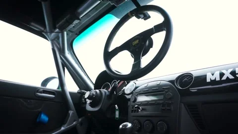 Cabin inside view of sport car racing on snow race track in winter. Footage Stock-Footage 133203733