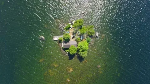 Cabin On A Lake Island 動画素材 343976745