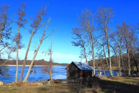 Cabin by the lake. Stock Photos