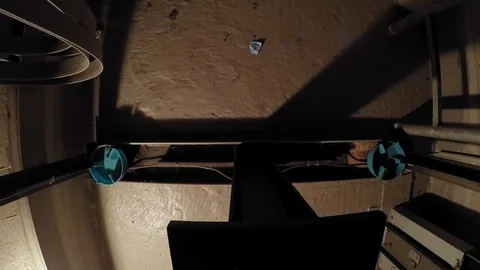 The cabin moves up in an elevator shaft. 02 Видео 88429664