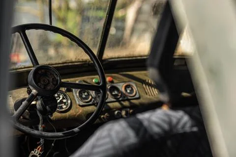 Cabin of an old rusty car. Old abandoned car. Stock Photos