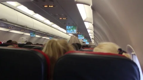 Cabin with the Passengers in Airplane Stock Footage 82276360