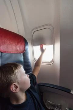 In the cabin of the plane the boy Фото