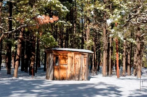 Cabin in the snow Stock Photos