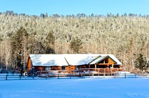 Cabin in snow Stock Photos