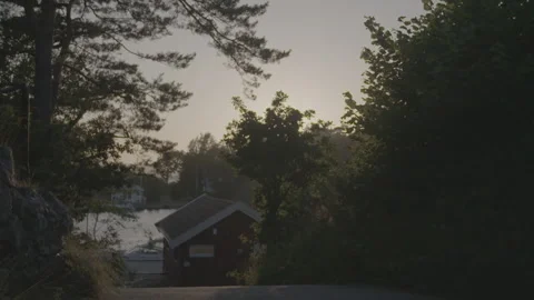 Cabin by the water, nice light 스톡 동영상 326217408