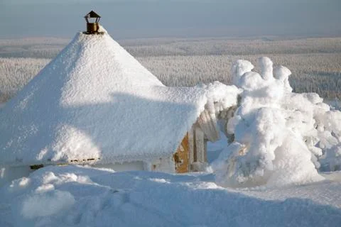 Cabin on winter landscape Stock Photos
