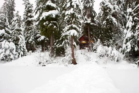 Cabin in winter Stock Photos