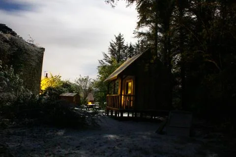 A cabin the in the woods Stock Photos