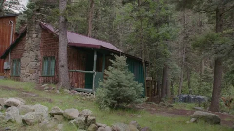 Cabin in the woods with river sounds Stock Footage 204873310