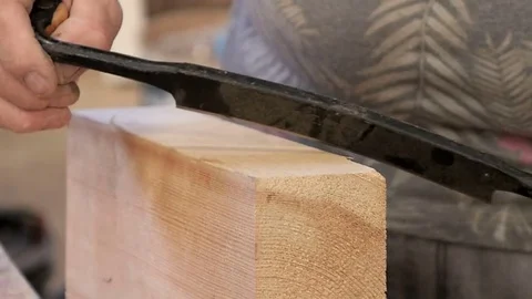 Cabinet maker chiseling wood Stock Footage 76414723