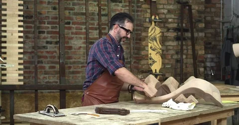Cabinet Maker is Happy with his Work Stock Footage 74206829