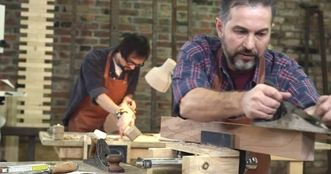 Cabinet Maker Planes the Beech Wood, Preparing it for Future Work Stock Footage 75832356