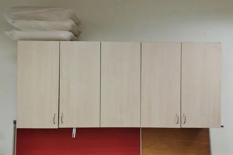 Cabinets are mounted on a wall 库存照片
