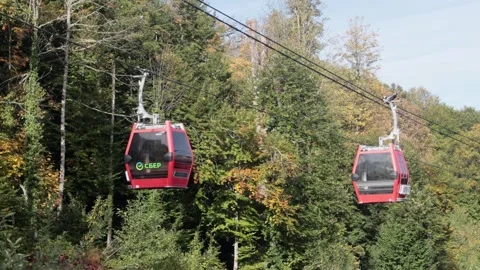 The cabins are going towards each other on the cable car. Mountain resort. Stock Footage 221303525
