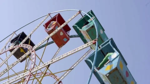 The cabins of a roller coaster can be seen up close. Stock Footage 300541025