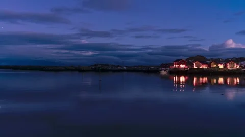 Cabins on a tiny island. Evening to night. 4K Time Lapse. Lofoten Islands Stock Footage 327715267