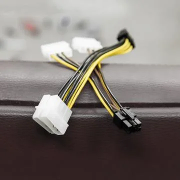 Cable 4 pin molex socket to sata adapter cable. Close-up computer power cable Stock Photos