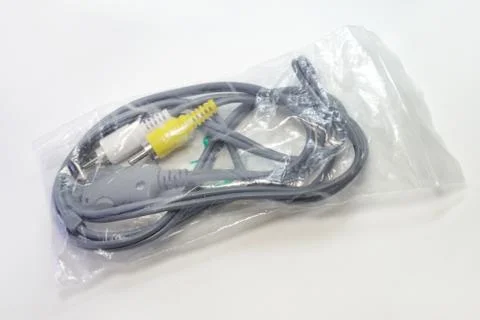 Cable for the analog connection of the digital camera to a TV Stock Photos