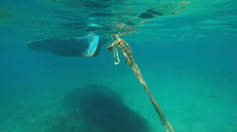 Cable from the anchor and the boat under water Stock Footage 69013838