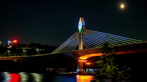 Cable bridge at durgam cheruv with indian flag lighting and moon rise in the sky Stock Footage 251089579