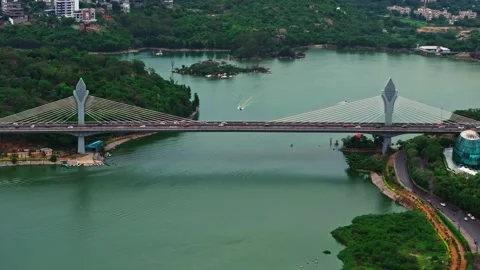 Cable bridge with Durgam Cheruvu, speed boats, Birds Island, road, moving Видео 345114674