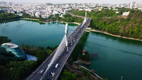 Cable bridge with traffic flow, durgam cheruvu, BR Ambedkar Open University Stock Footage 345717890