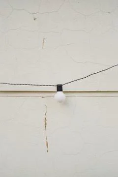 A cable with a bulb. Stock Photos