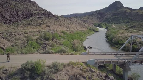 Cable Cam of Man Riding One Wheel + Stock Footage 80006097