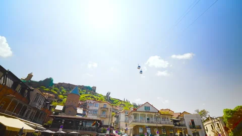Cable car above the rooftops of Old Tbilisi Stock-Footage 345098074
