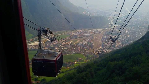 Cable car and aerial view of mountain landscape in Trentino Alto Adige, Italy Stock Footage