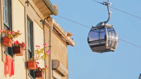 Cable car and Vila Nova de Gaia Old houses Stock Footage 108471573
