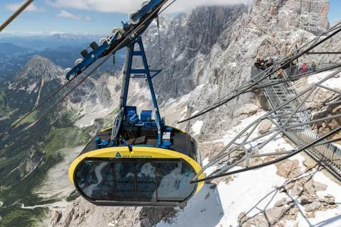 Cable car approaching the Austrian Dachstein glacier mountain station Stock Photos