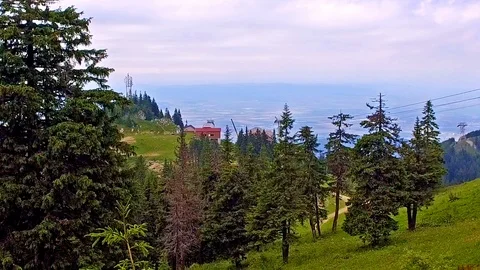 Cable car with buildings on mountain Romania Stock Footage 103789618