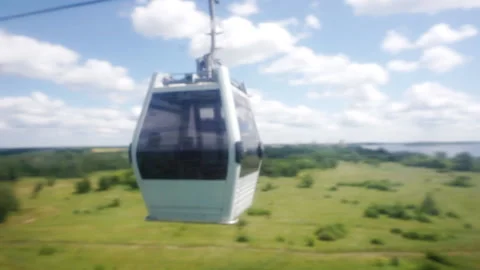 The cable car cabin passes by another cabin. Stock Footage 135342421