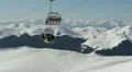 Cable Car Cabin Passing Over a Beautiful Snowed Conifer Forest Landscape Nature HD Footage