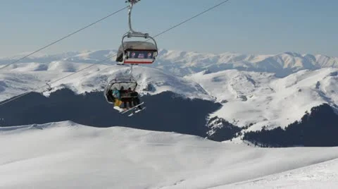 Cable Car Cabin Passing Over a Beautiful Snowed Conifer Forest Landscape Nature Stock Footage 22025122