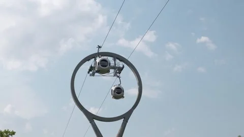 Cable car cabins above the trees Stock Footage 312947840
