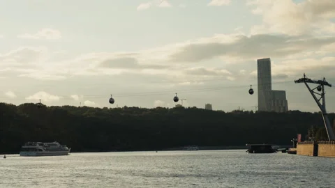 Cable car cabins gliding over the moscow river at sunset Stock-Footage 345120281