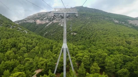 Cable car cabins in a mountain in Greece Stock Footage 165986437