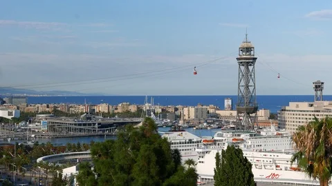 Cable car cabins moving over Barcelona harbour, Stock Footage 102603120