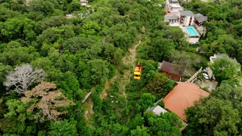Cable car cableway funicular wagon rises up Mount. Transport to mountain top Stock Footage 170379284