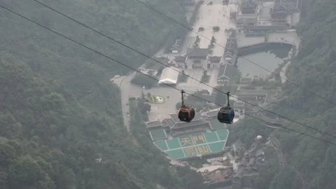 Cable car cableway visit Tianmen cave or Heaven Gate in Tianmen Mountain Park Stock Footage 279924434