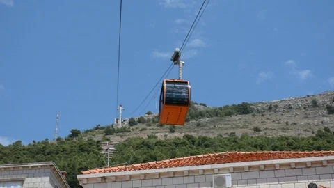 Cable car coming down from the mountain in Dubrovnik, Croatia Stock Footage 112742543