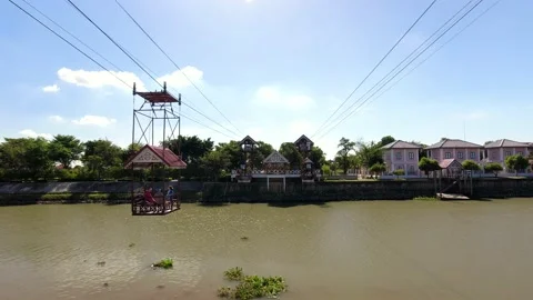 Cable car crossing the Choa Phraya river to Wat Niwet Thammaprawat Temple Stock Footage 157160855