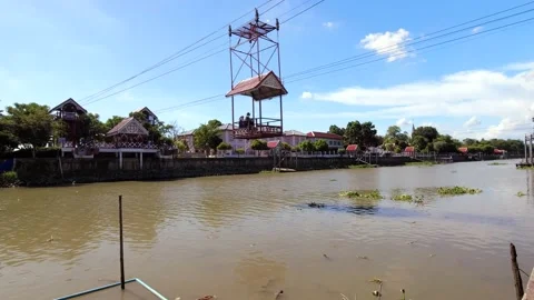 Cable car crossing the Choa Phraya river to Wat Niwet Thammaprawat Temple Stock Footage 157160934