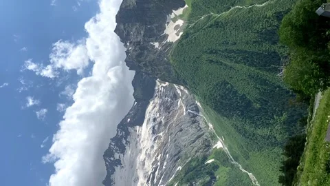 Cable car in the Dombay Russia. View of the snow-capped mountains. Video stock 202012262