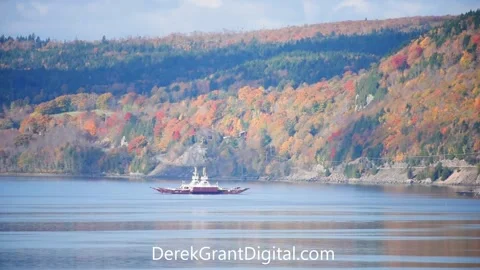 Cable Car Ferries cross pass on river in autumn transitional Stock Footage 138336911