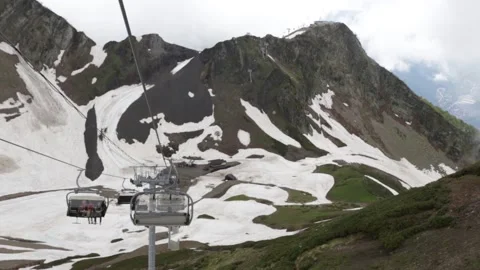 Cable car in a forest and mountains of North Caucasus, Russia Видео 146727875