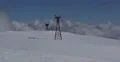 Cable Car Going Down Chairlift Passing Ski Resort Mountain Peak Winter Landscape 4k or 4k+ Resolution
